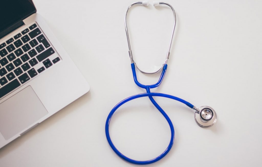 a stethoscope on a white surface