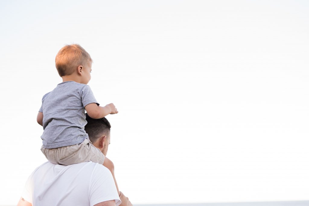 a person holding a baby