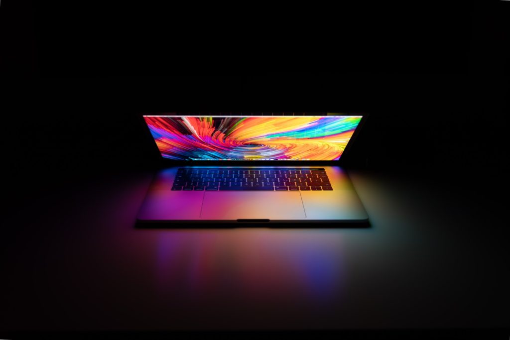 a laptop with colorful designs