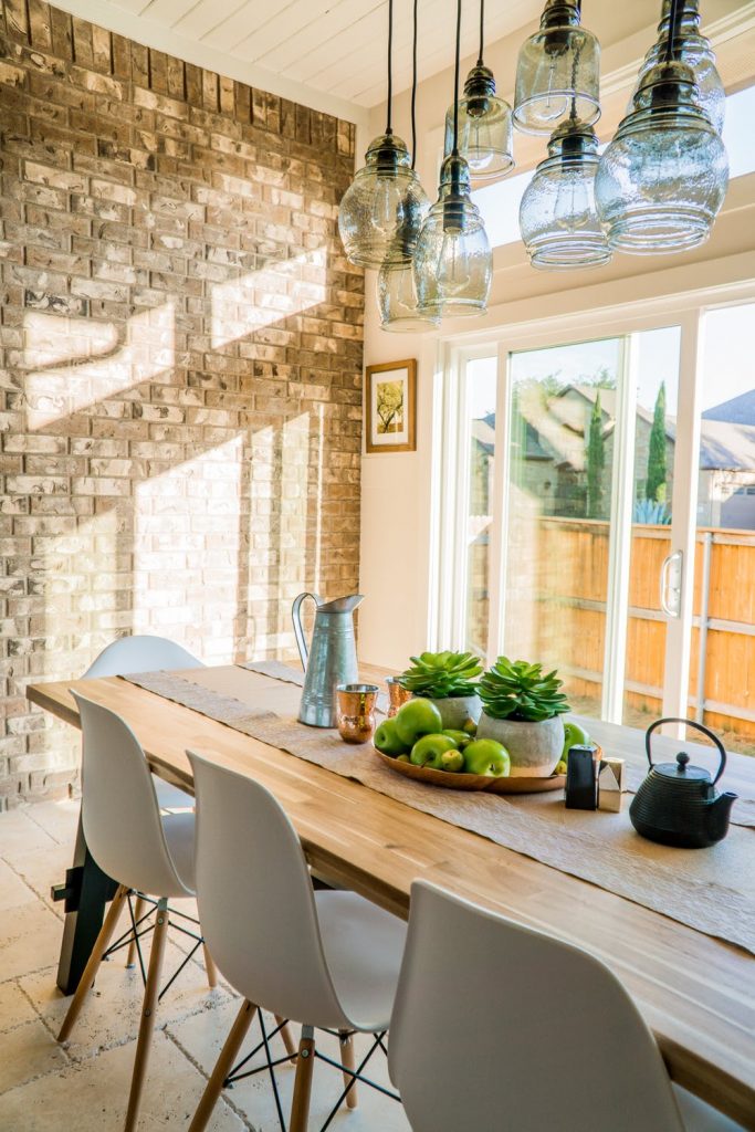 a kitchen with a table and chairs