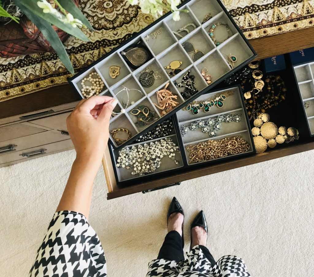 a person's feet on a table with a game board and a game board