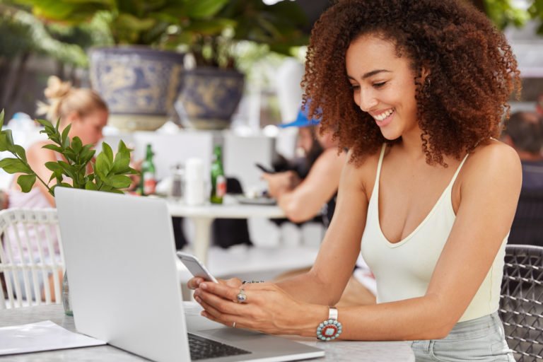 a woman looking at a tablet