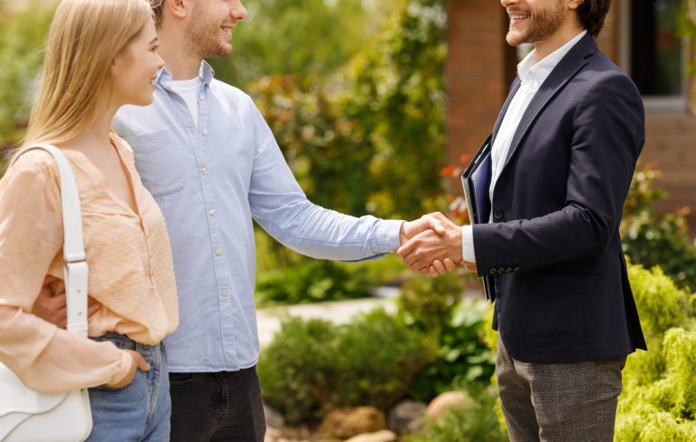 a group of people shaking hands