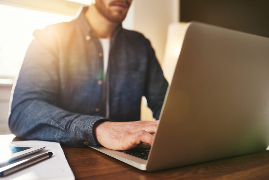 men on a laptop