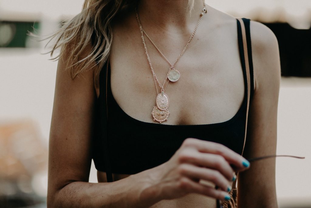 Female with Layer Necklaces